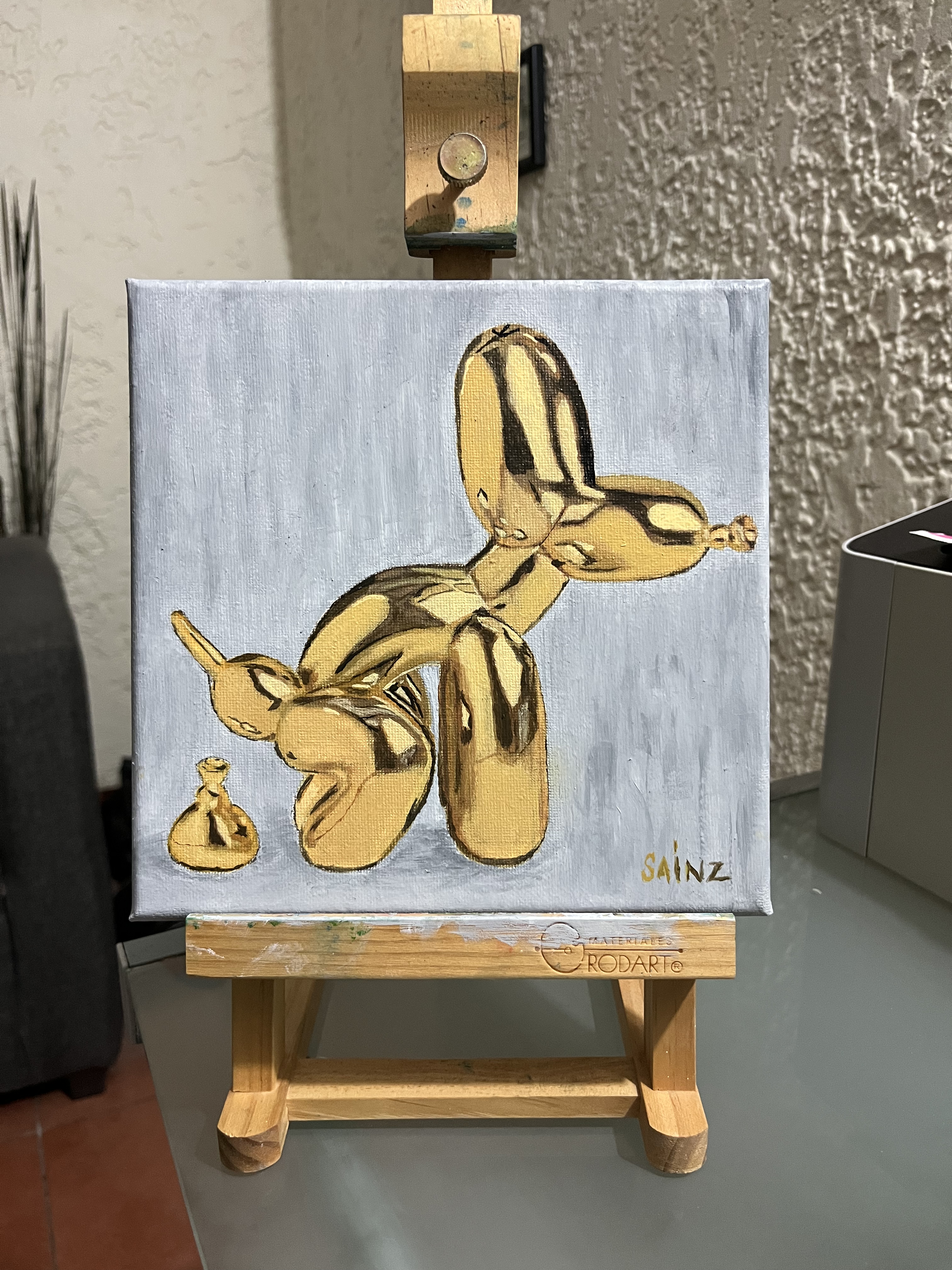 Milaneso, pintura al óleo de un perro de globo dorado.
